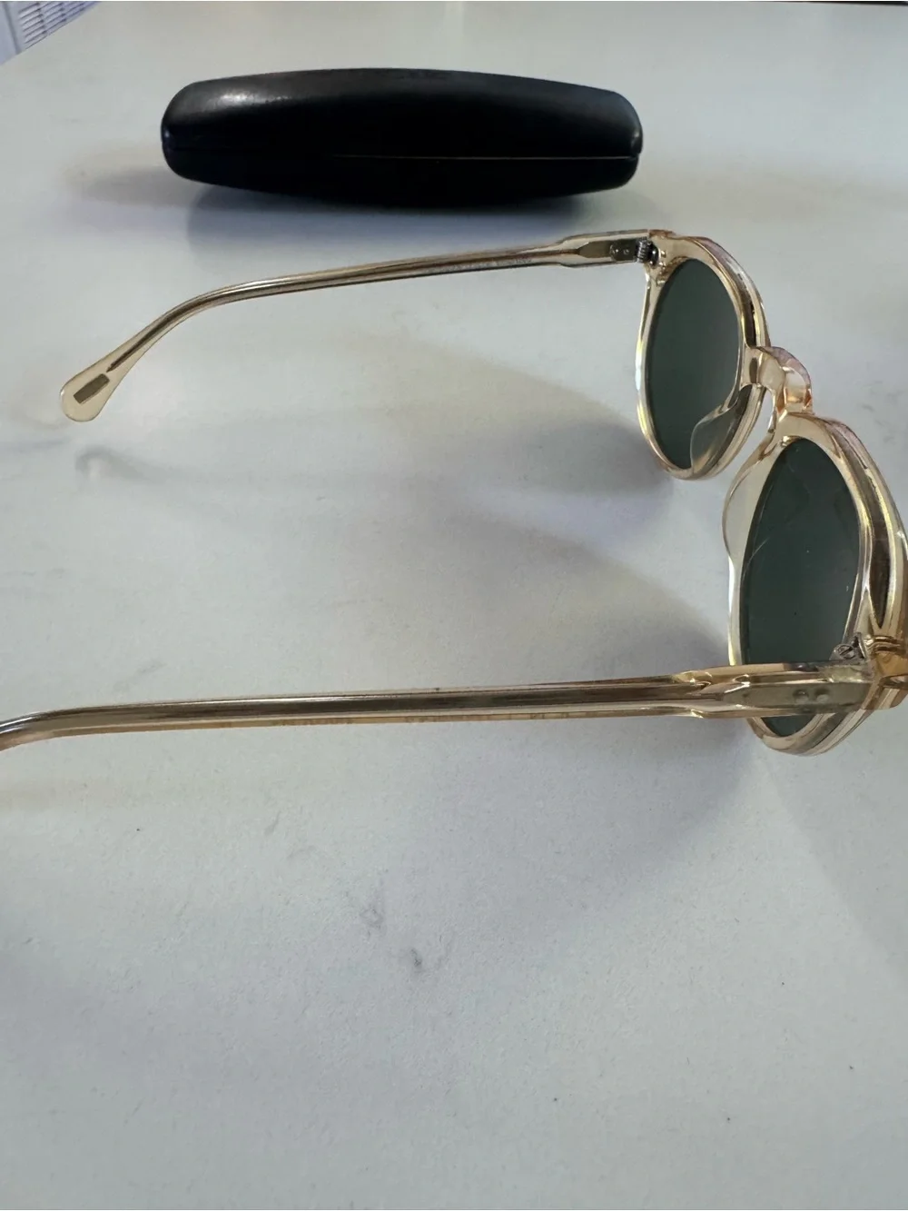 RAEN Remmy Sunglasses in champagne crystal with Dark Green Lenses